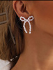PEARL BOW - kolczyki w stylu vintage ze sztucznymi perłami w kształcie kokardki